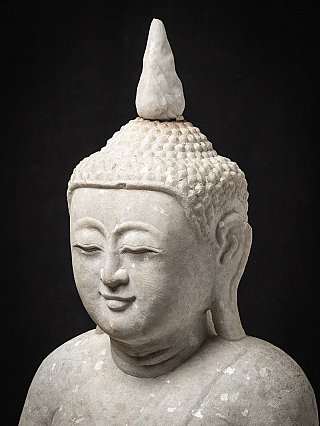 Old marble Burmese Buddha statue