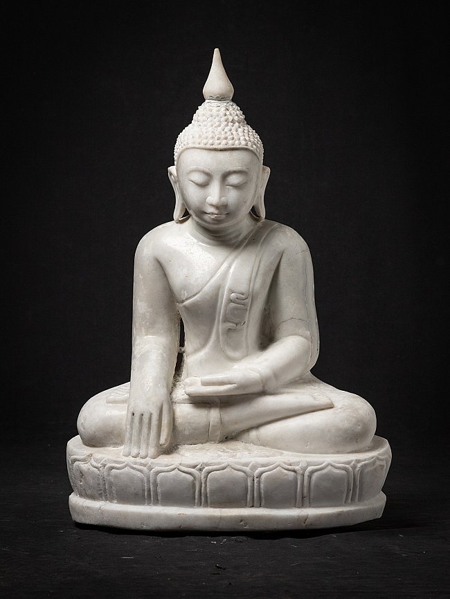 Old marble Burmese Buddha statue