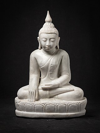 Old marble Burmese Buddha statue