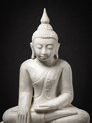 Old marble Burmese Buddha statue