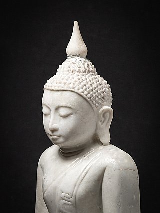 Old marble Burmese Buddha statue