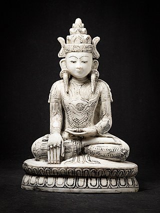Alte gekrönte Buddha figur aus Marmor