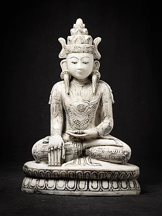 Old marble Crowned Buddha statue