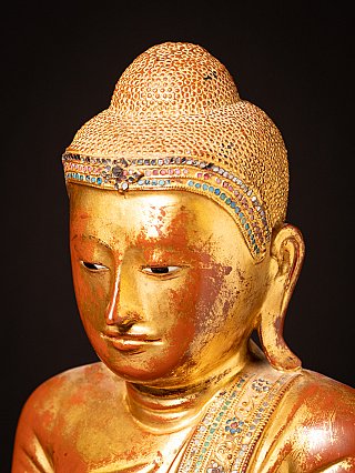 Beautiful antique wooden Burmese Mandalay Buddha