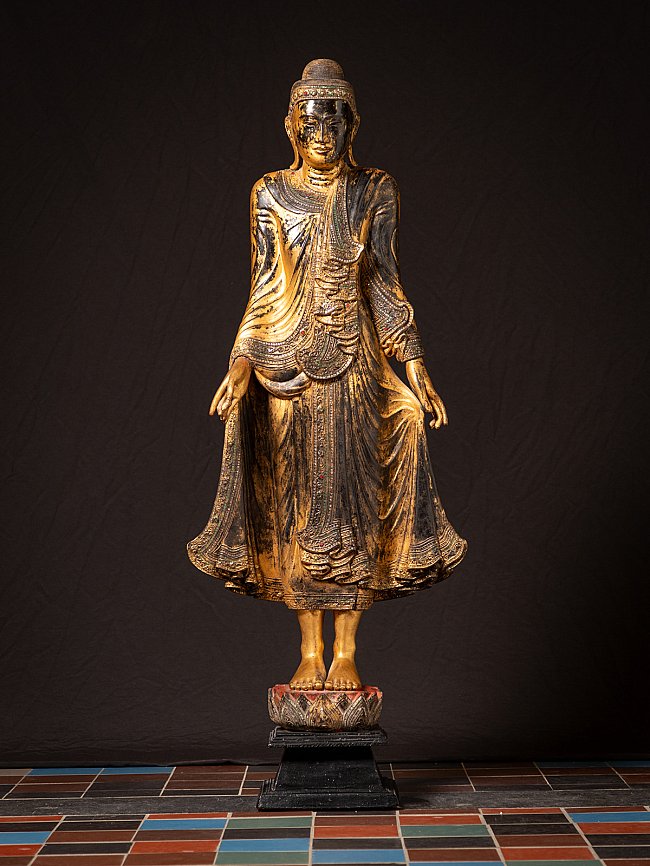 Burmese wooden Buddha statue, full front view, black lacquer with gilded finish, 19th century