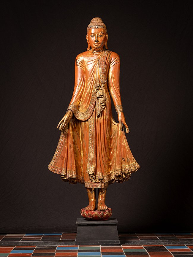 Buddha statue from Burma in Mandalay style, 19th century, full frontal view on pedestal