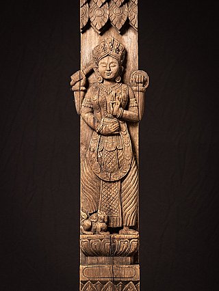 Antique wooden Burmese temple panel with female Spirit