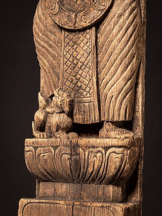 Antique wooden Burmese temple panel with female Spirit