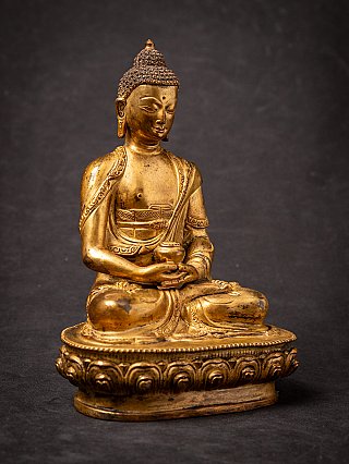 Old bronze Nepali Buddha statue