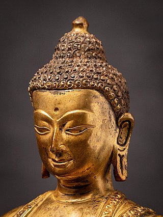 Old bronze Nepali Buddha statue