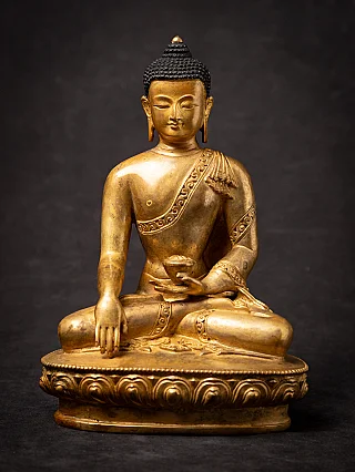 Old bronze Nepali Buddha statue