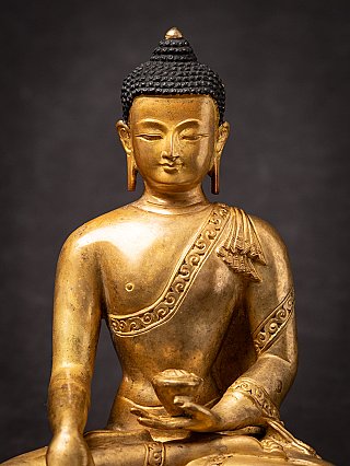 Old bronze Nepali Buddha statue