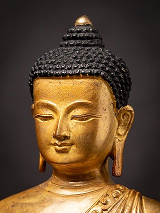 Old bronze Nepali Buddha statue