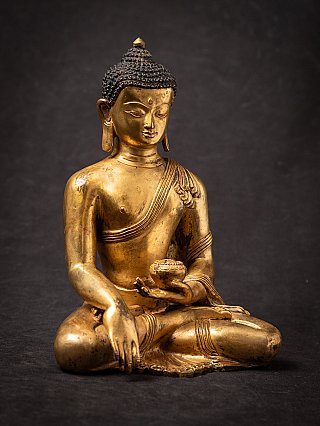 Old bronze Nepali Buddha statue