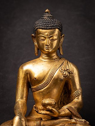Old bronze Nepali Buddha statue