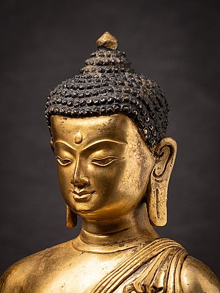 Old bronze Nepali Buddha statue