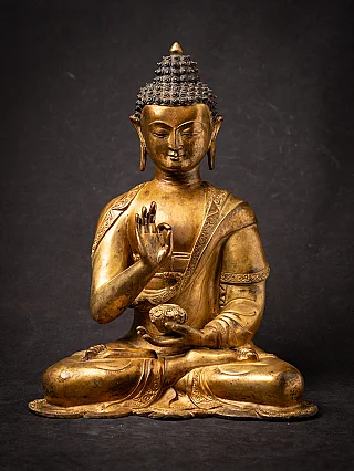 Old bronze Nepali Buddha statue