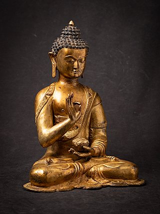Old bronze Nepali Buddha statue