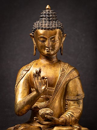 Old bronze Nepali Buddha statue