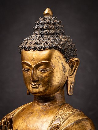 Old bronze Nepali Buddha statue