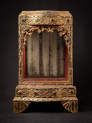 Antique wooden Burmese Buddha temple