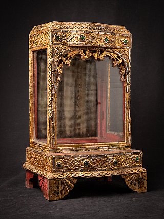 Antique wooden Burmese Buddha temple