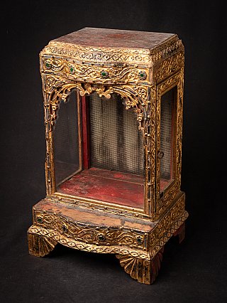 Antique wooden Burmese Buddha temple