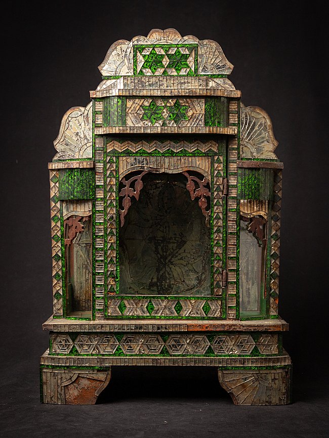 Antique wooden Burmese temple shrine with green glass inlay, full front view