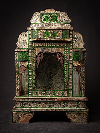 Antique wooden Burmese temple shrine with green glass inlay, full front view