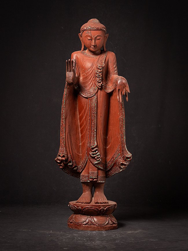 Old wooden Burmese Buddha statue