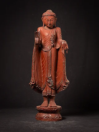 Old wooden Burmese Buddha statue