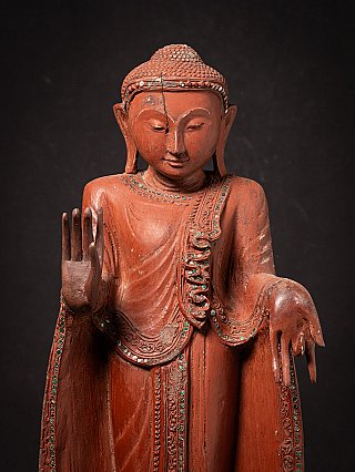 Old wooden Burmese Buddha statue