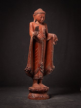 Old wooden Burmese Buddha statue