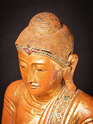 Antique wooden standing Mandalay Buddha