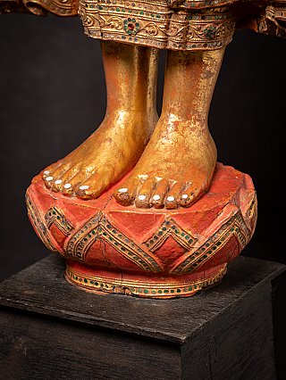 Antique wooden standing Mandalay Buddha