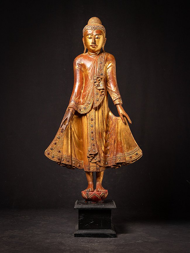 Antique wooden standing Mandalay Buddha