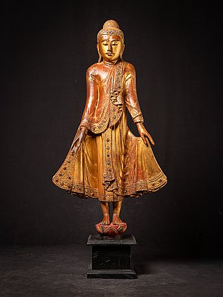 Antique wooden standing Mandalay Buddha