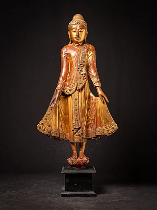 Antique wooden standing Mandalay Buddha