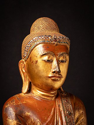 Antique wooden standing Mandalay Buddha