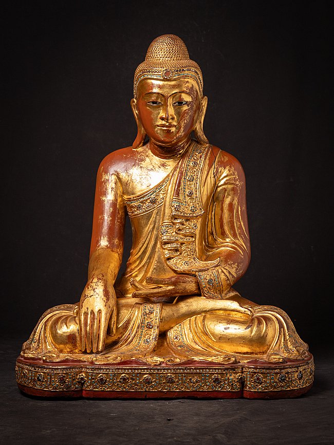 Beautiful antique wooden seated Mandalay Buddha statue