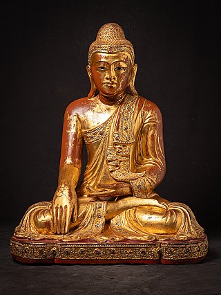 Burmese Mandalay Buddha statue in wood, seated in bhumisparsha mudra, full front view