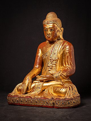 Beautiful antique wooden seated Mandalay Buddha statue