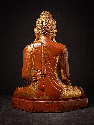 Beautiful antique wooden seated Mandalay Buddha statue