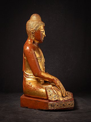Beautiful antique wooden seated Mandalay Buddha statue
