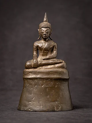 Antique bronze Buddha statue from Laos