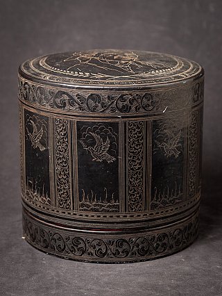 Burmese lacquerware betelnut box with engraved bird panels and fitted lid