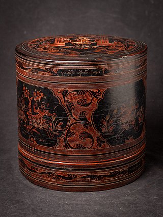 Burmese lacquerware betelnut box with closed lid and red engraved decoration