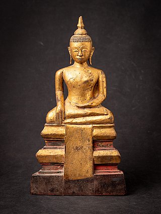 Cambodian wooden Buddha statue, seated in bhumisparsha mudra, full front view