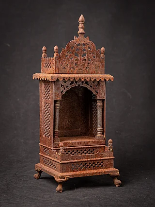 Old metal Buddhist shrine