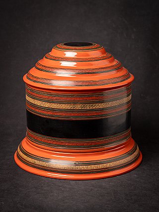Burmese lacquerware betel box with lid, orange and black bands, three-quarter view